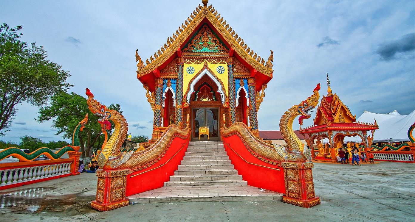 An elaborately decorated building with steps leading upto it.