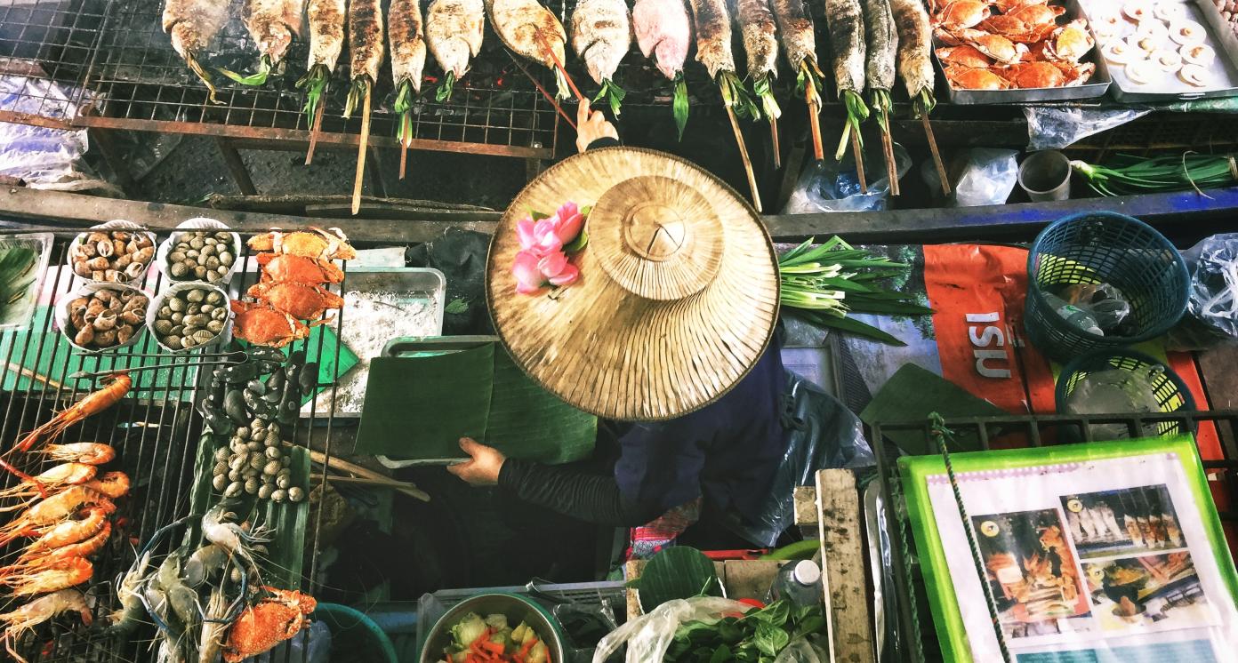 Person wearing conical hat