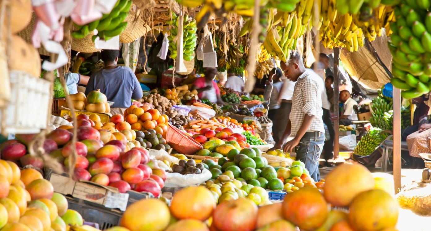 NAIROBI, KENYA- FEBRUARY 6, 2014: Ripe fruits stacked at a local fruit and vegetable market on February 6, 2014. Nairobi, Kenya. The market is frequently visited by locals and tourists.