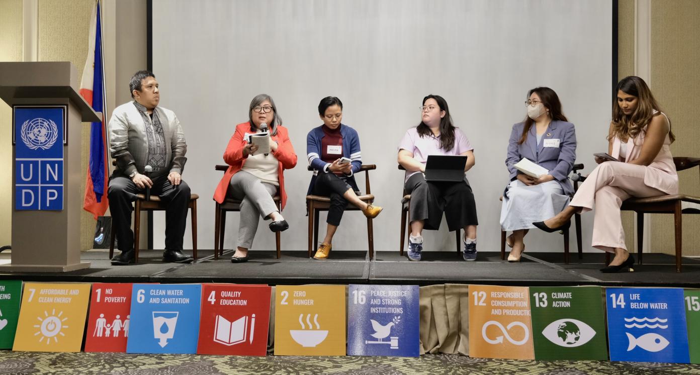 Panelists speak at a discussion forum held in Makati City, the Philippines, on 11 November 2024. 