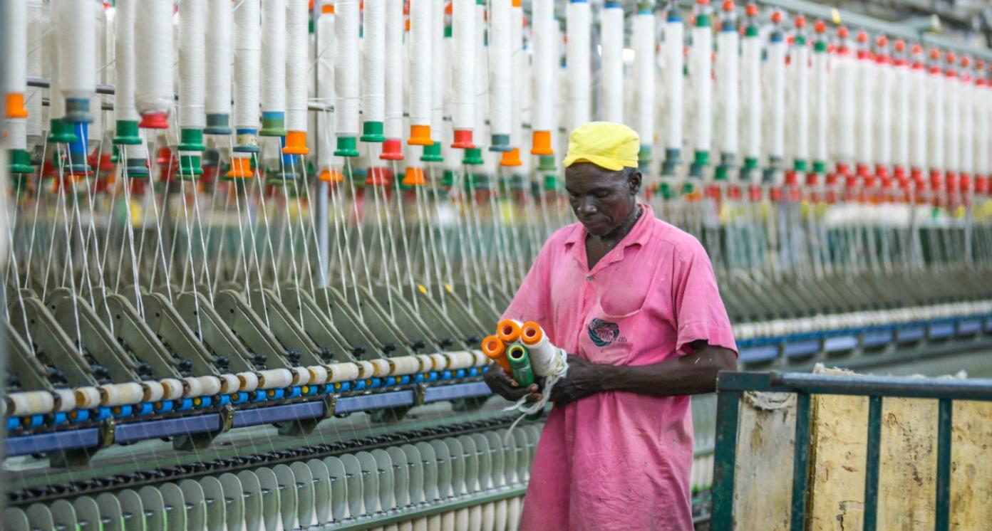 Worker in Nigerian textile manufacturing