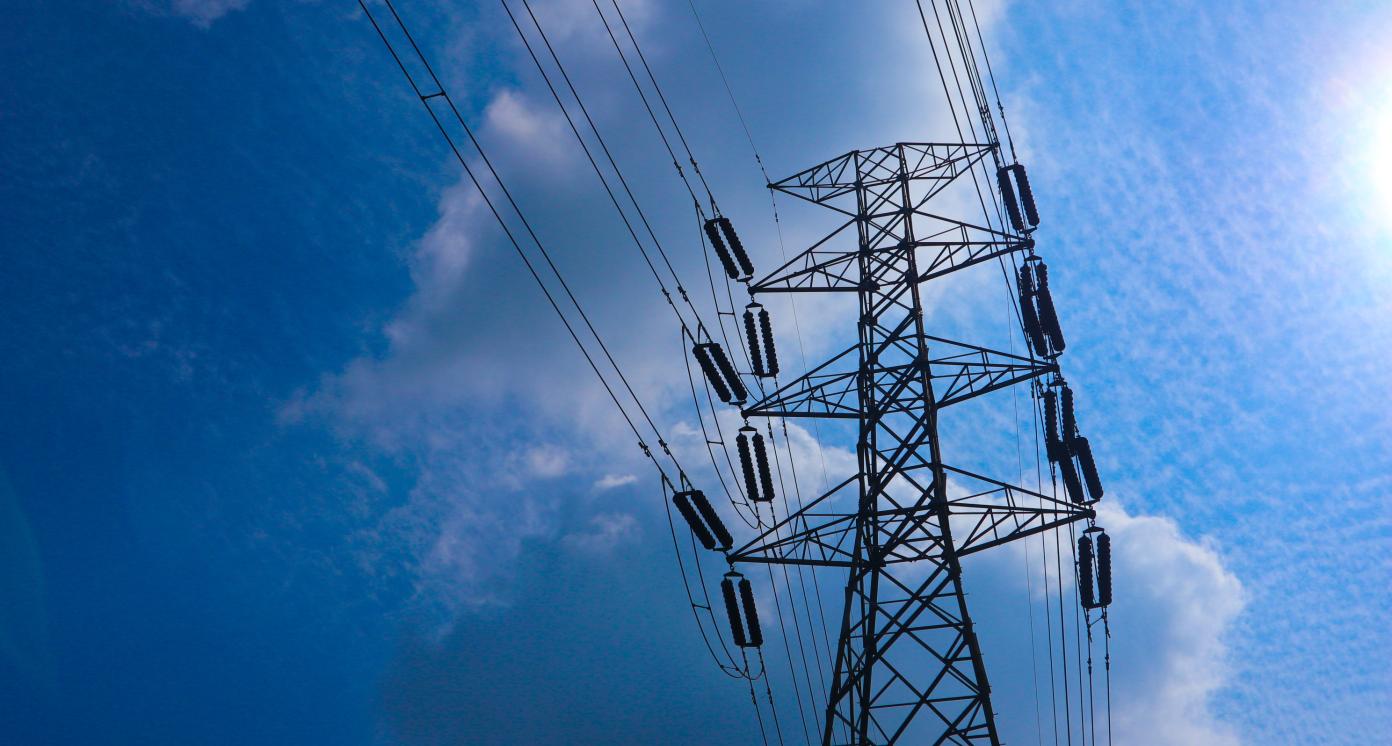 the pylon outline, Very High Voltage Power Lines (Indonesia : SUTET) on blue sky