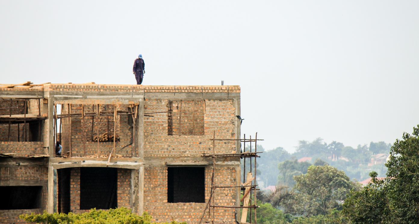 NAALYA TOWNSHIP, KAMPALA, UGANDA - SUMMER 2016 Naalya is quickly developing into a middle class residential neighborhood with high-rise apartment complexes and modest residential bungalows