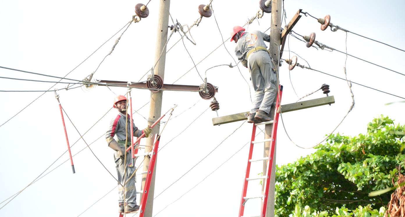 Power distributor engineers are working on the damaged pole in Lagos Nigeria, 23rd June 2019. Nigeria