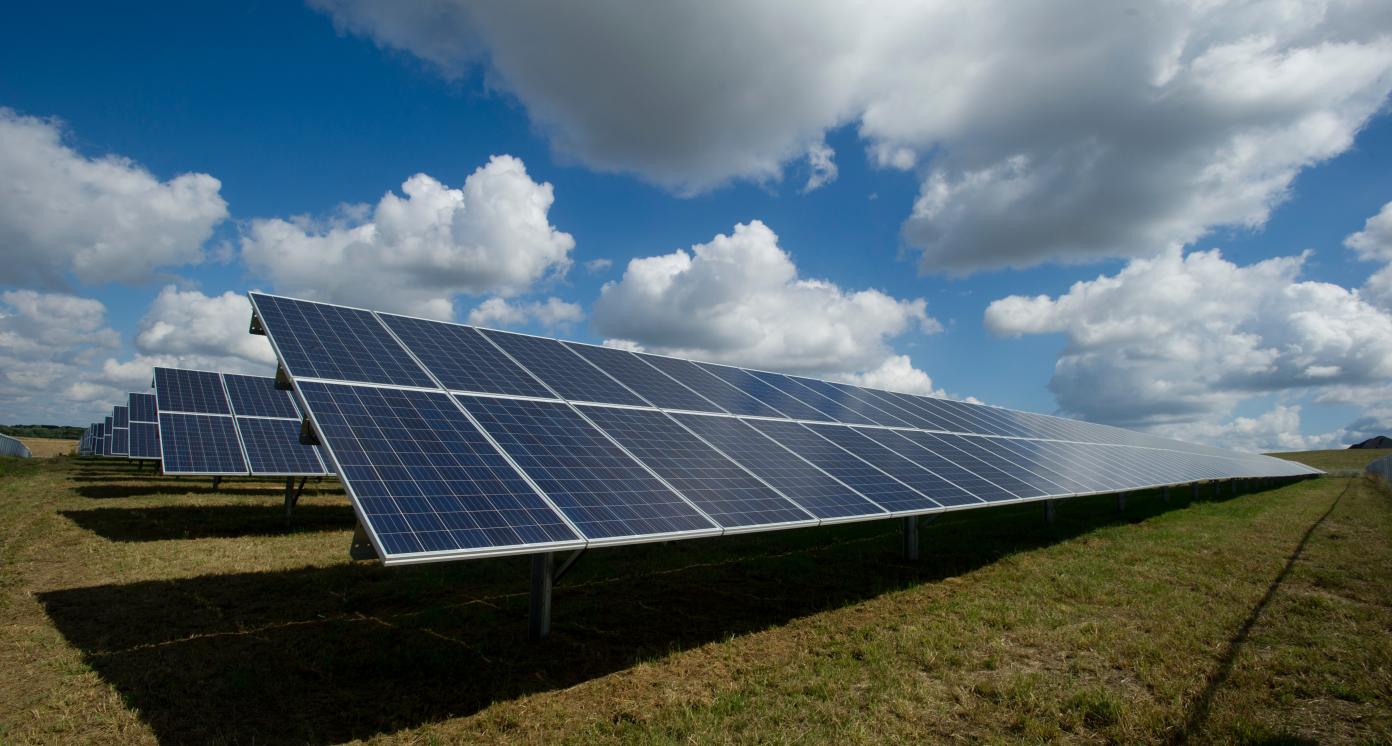 solar panels on a green field