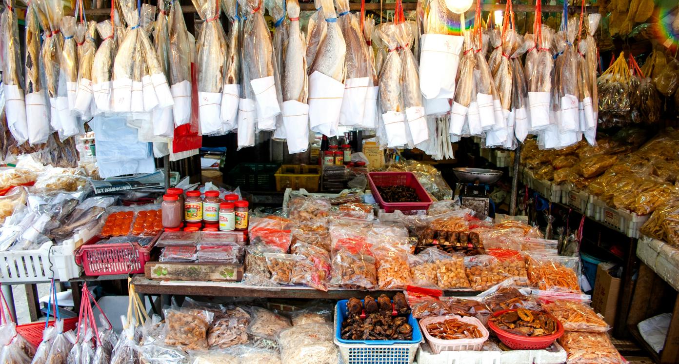 assorted preserved food on display at a shop