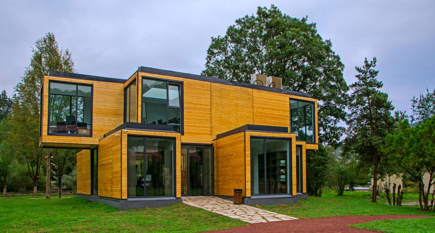 Dilijan, Armenia - August 25, 2018: The wooden house on the nature. Modern design architecture. Environmentally friendly housing concept with wooden house. Real estate in green forest