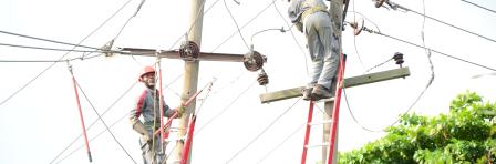 Power distributor engineers are working on the damaged pole in Lagos Nigeria, 23rd June 2019. Nigeria