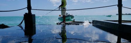 Local fisherman with fishing. Mauritius, Coral Azur Resort.