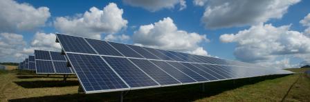 solar panels on a green field