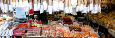 assorted preserved food on display at a shop