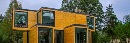 Dilijan, Armenia - August 25, 2018: The wooden house on the nature. Modern design architecture. Environmentally friendly housing concept with wooden house. Real estate in green forest