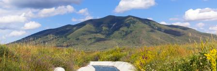 View of Mount Arailer. Irrigation canal in the valley between the mountains. Armenia