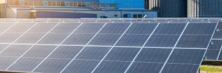 Solar photovoltaic panels in solar farm used to produce mill in a flour mill in Tirana, Albania. Sustainable energy, electric power generation, decarbonization, renewable green energy