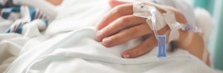 Mother with newborn on a hospital bed