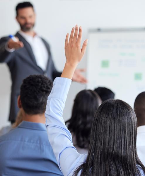 Train the Trainer special box image of a woman attending a class and asking a question