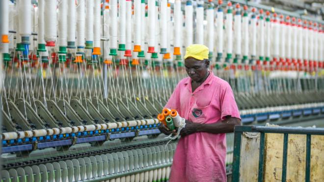 Worker in Nigerian textile manufacturing