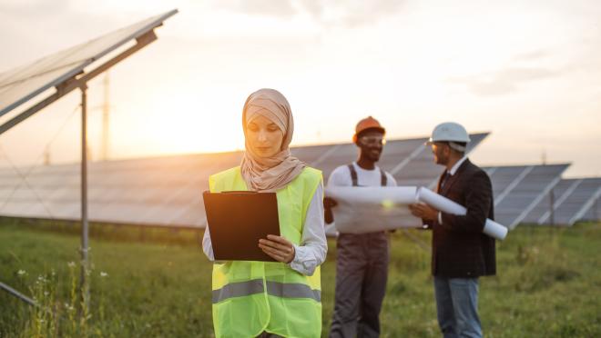 Woman clipboard solar panels